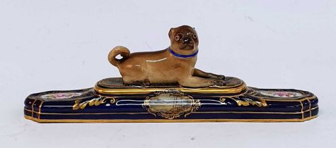 A 19th century Meissen porcelain paperweight, in the form of a recumbent pug dog, mounted upon a