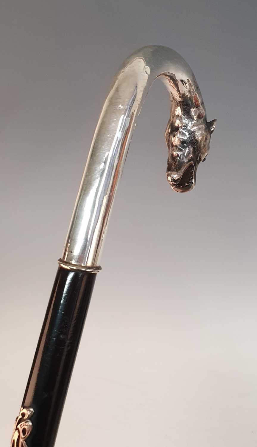 An early 20th century walking stick, the continental silver handle in the form of a leopard's - Image 2 of 14