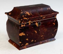 A 19th century tortoiseshell and ivory tea caddy, the cavetto moulded lid having vacant cartouche