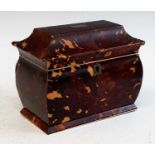 A 19th century tortoiseshell and ivory tea caddy, the cavetto moulded lid having vacant cartouche