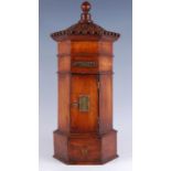 A Victorian style mahogany pillar box, of octagonal form with brass fittings and base drawer, h.