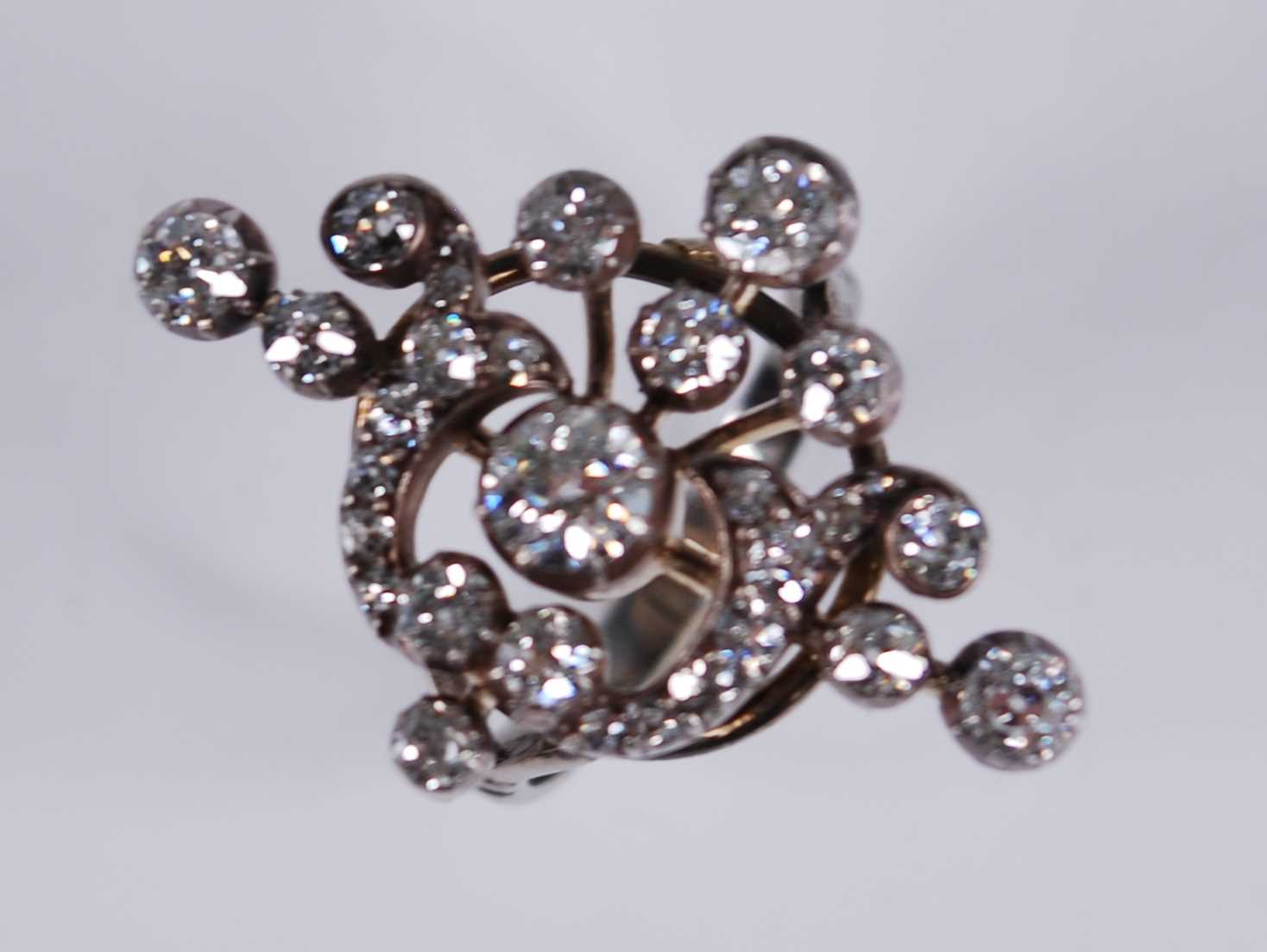 A white metal diamond openwork navette shaped cluster ring, comprising 30 Old European and rose - Image 2 of 4