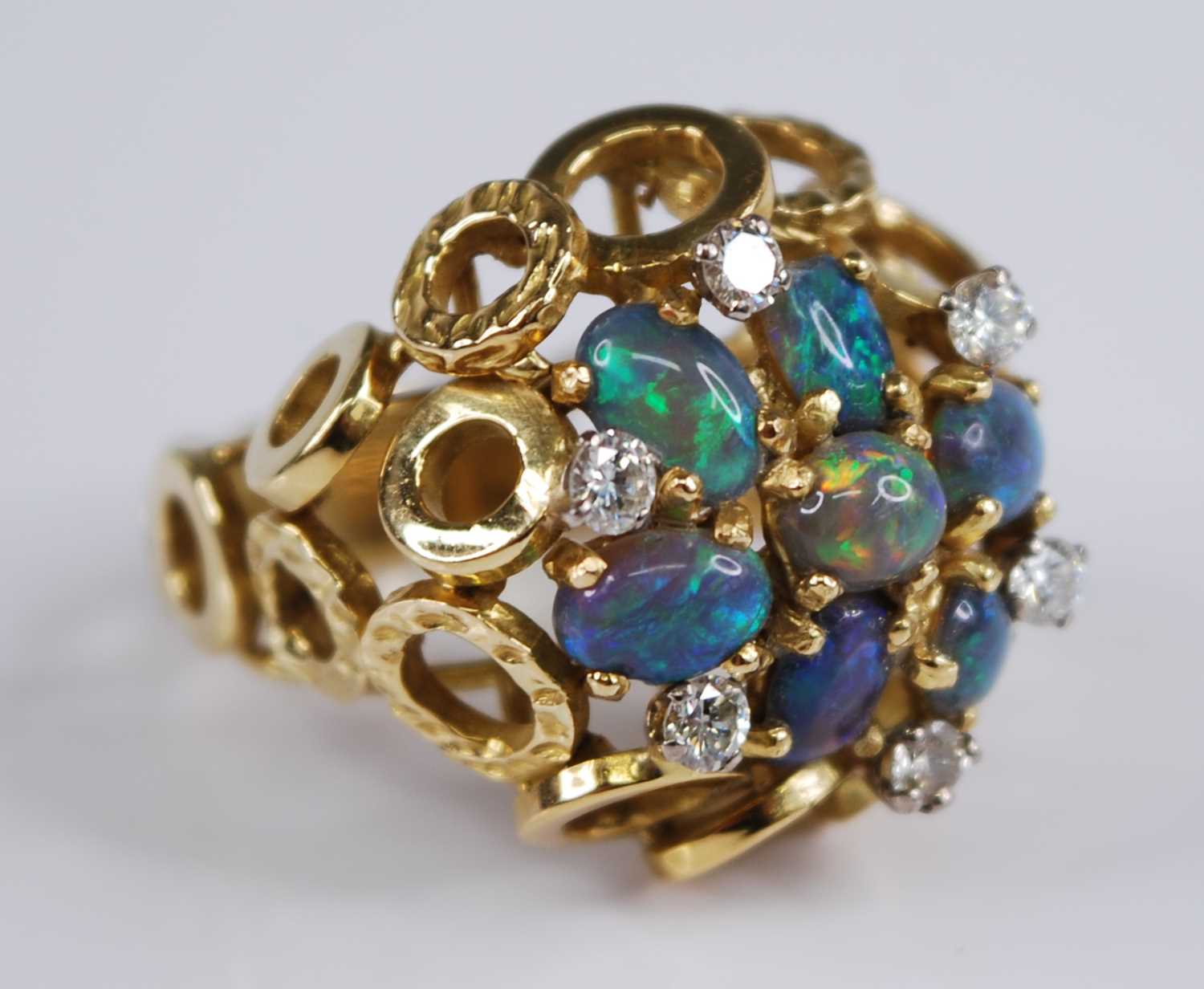 An 18ct yellow gold, opal and diamond bombe cluster ring, comprising seven opal cabochons - Image 2 of 7