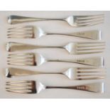 A set of early Victorian silver forks, being six table and six dessert forks, in the Old English
