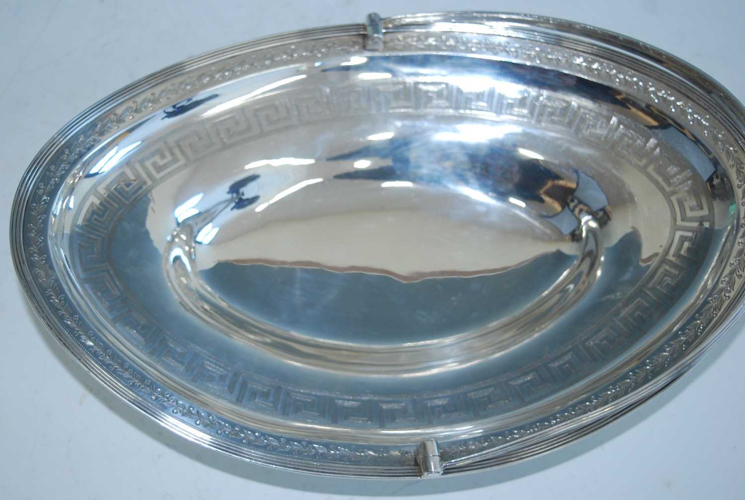 A George III silver pedestal bread basket, of elliptical form with reeded rim and reeded swing - Image 2 of 5