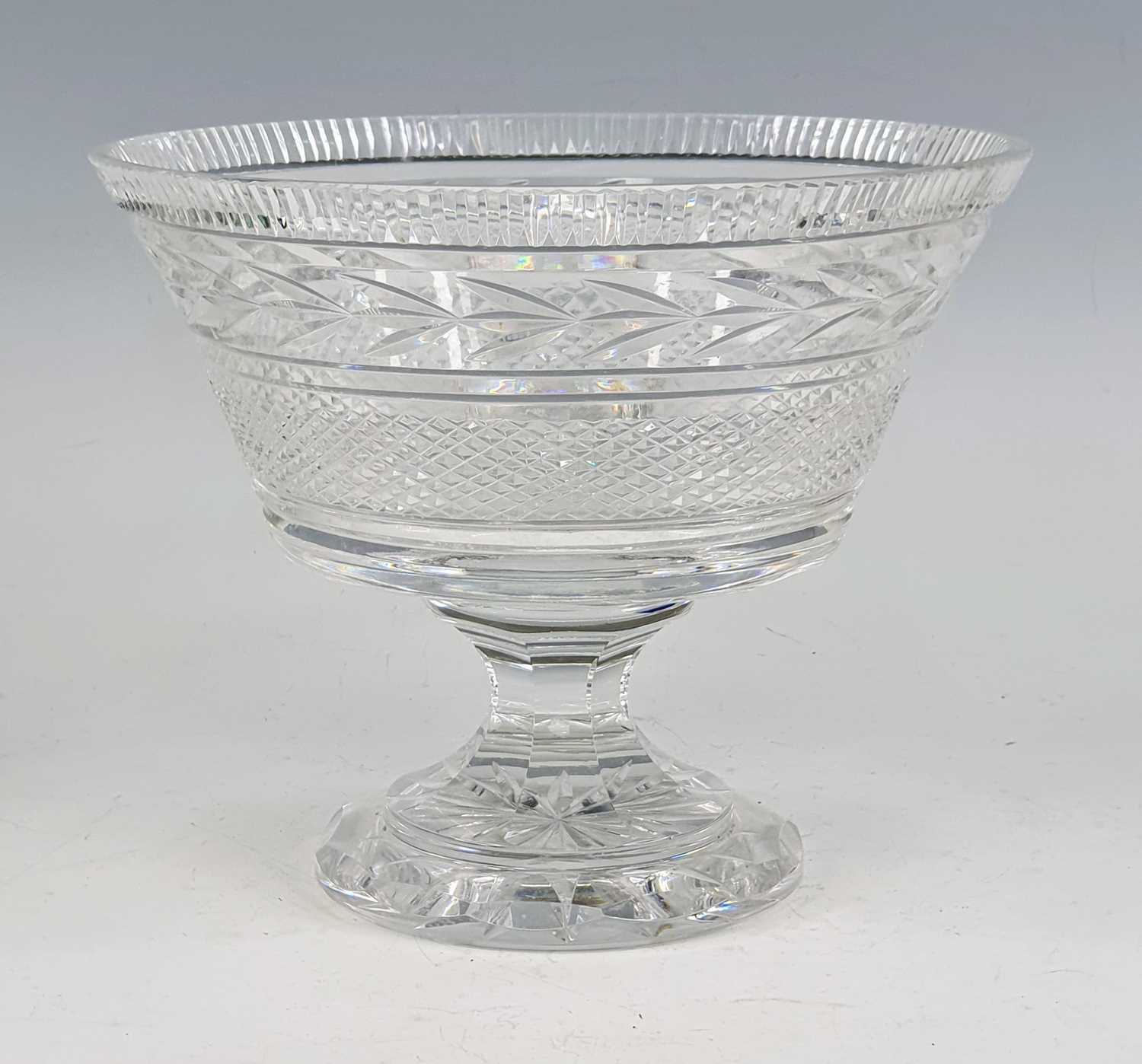 A Waterford Crystal Glandore pattern pedestal fruit bowl, the everted bowl above a faceted stem,