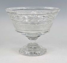 A Waterford Crystal Glandore pattern pedestal fruit bowl, the everted bowl above a faceted stem,
