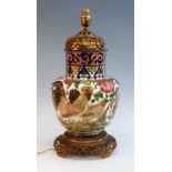A circa 1900 Zsolnay Pecs earthenware table lamp, of baluster form, decorated with cockerels amongst