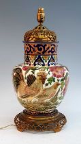 A circa 1900 Zsolnay Pecs earthenware table lamp, of baluster form, decorated with cockerels amongst
