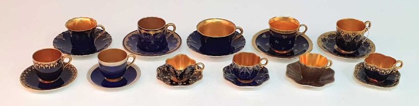 A collection of eleven late 19th/early 20th century Coalport and Royal Worcester coffee cans, each