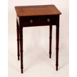 An early 19th century mahogany round cornered single drawer side table, raised on ring turned