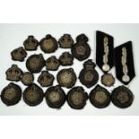 A quantity of North Riding Constabulary bullion-embroidered cloth cap badges, King's crowns and