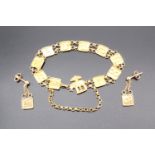 An Asian high carat yellow metal plaque bracelet and conforming ear pendants, 10.4 g