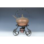 A copper and wrought iron spirit kettle, 33 cm