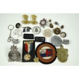 A collection of badges comprising "West Riding Fire Service", "Police Athletic Association"medal