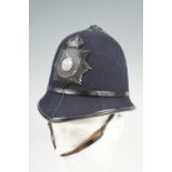 A West Riding Constabulary Custodian helmet, having a two tone night plate with a king's crown, "