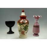 A Opaline Veritable black glass goblet together with a Victorian trail decorated glass vase and a