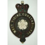 A West Riding Constabulary cast iron sign, painted with a white rose in the centre and crested