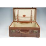 An early 20th Century hide luggage case, 52 cm x 35 cm x 18 cm