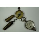 A portable brass corkscrew, map gauge and compass