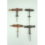 Four 19th Century corkscrews having Henshall type discs