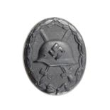 A German Third Reich black wound badge, marked "3" indicative of Deumer production