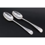 A pair of George III Scottish silver Old English pattern table spoons, bearing engraved marriage