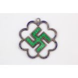 An early 20th Century English enamelled silver swastika pendant, registered design number 575,