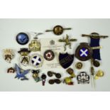 A quantity of vintage lapel badges etc, including a Border Regiment sweetheart brooch, British Red