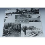 Nine large scale photographs of British soldiers in action during the Far East Campaign, 12 " x 16"
