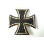 A German Third Reich Iron Cross first class, the pin stamped L/52