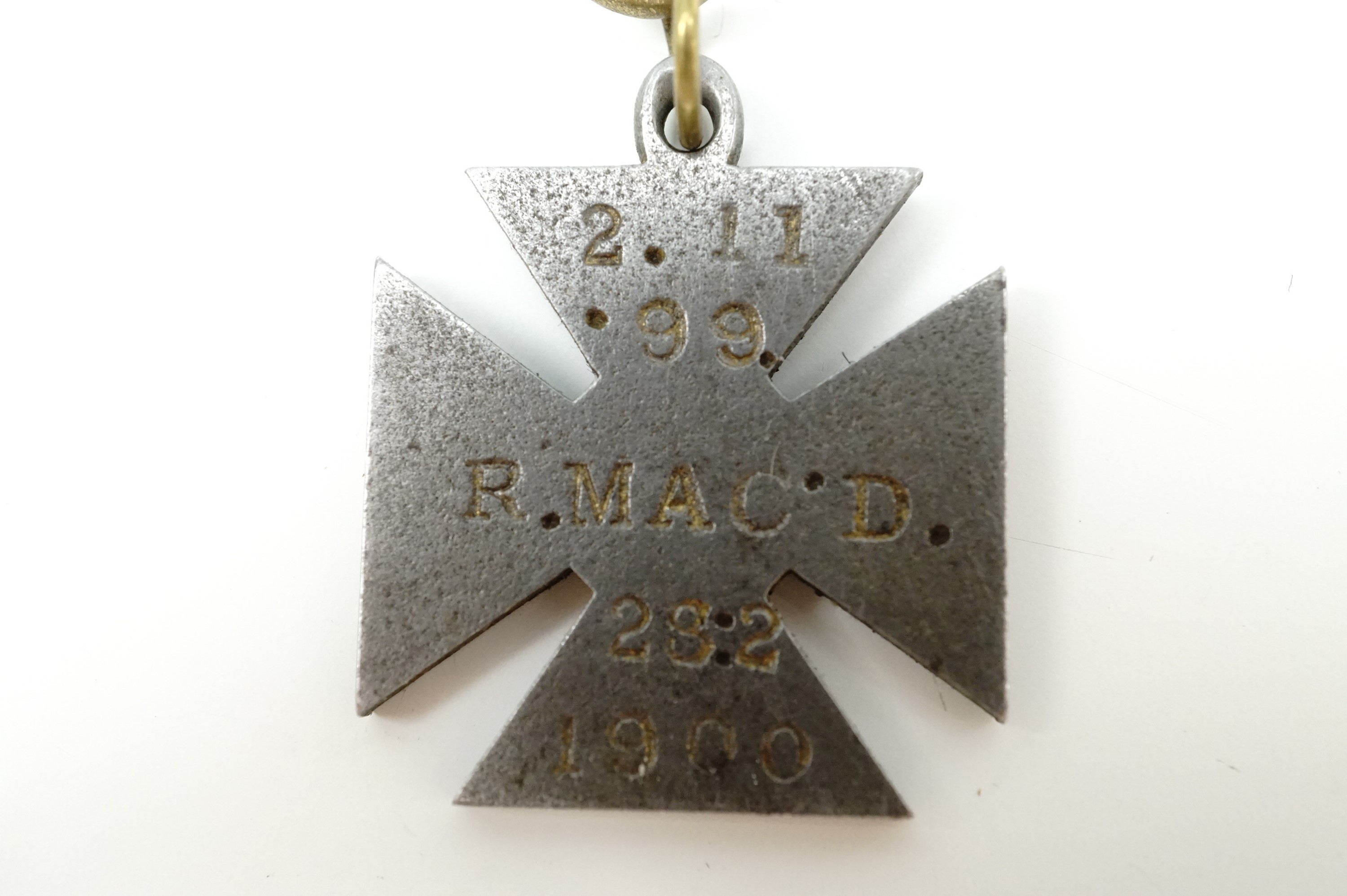 A Boer War period steel watch chain fob medallion in the form of a cross and bearing the struck - Image 3 of 3