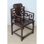 A fine pair of Chinese carved hongmu / hardwood arm chairs, 19th / early 20th Century. [Brought to