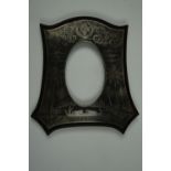 A early Twentieth Century Asian koftgari style silvered iron and rosewood photograph frame, 18.5 cm