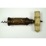 An early 19th Century Thomason type double-action corkscrew, having a Gothic pattern bronze barrel