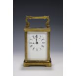 A brass carriage clock, 12 cm