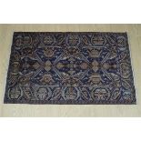 A large Persian wool pile rug, 185 x 115 cm