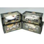 Four boxed Burago die cast 1/18 scale model cars comprising a Mercedes,a Bugatti Grand Prix (