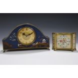 A petit point dressing table clock together with an oriental mantle clock with quartz movement,