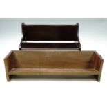 Three wooden book troughs, largest 50 cm