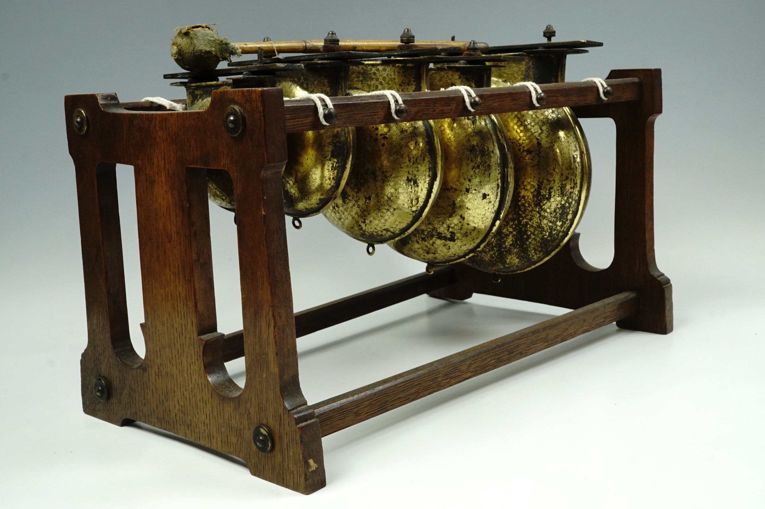 A late 19th Century idiophone type percussion musical instrument, comprising a graded set of brass - Image 3 of 3