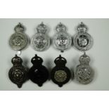 A collection of Police cap badges, North, West and East Riding Constabularies including with King'