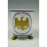 A K.P.M gilt and enameled cup commemorating the Prussian state governments 100th anniversary on
