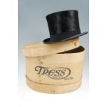 A 1920s Tress & Co London 'long oval' top hat in original box, size 6 7/8