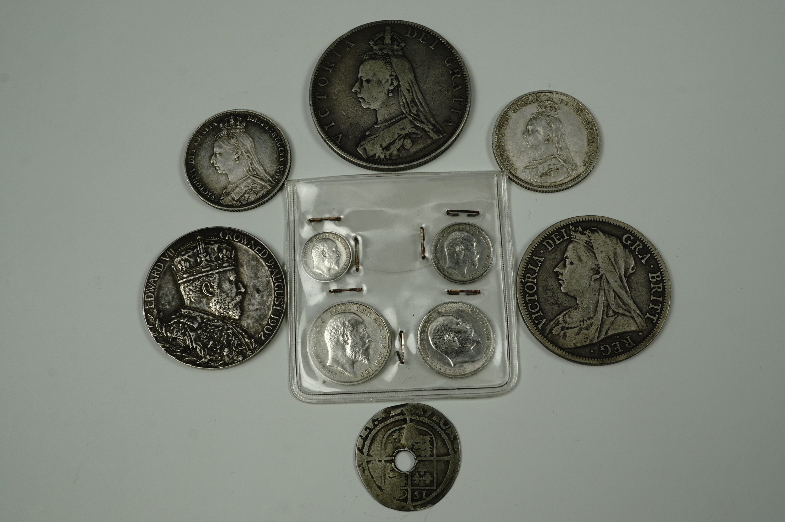 A 1902 Maundy set together with a 1902 coronation commemorative, sundry Victorian silver coins and