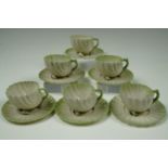 A Belleek "Neptune" shell-form tea / coffee set, comprising six cups with saucers, latter 11 cm,