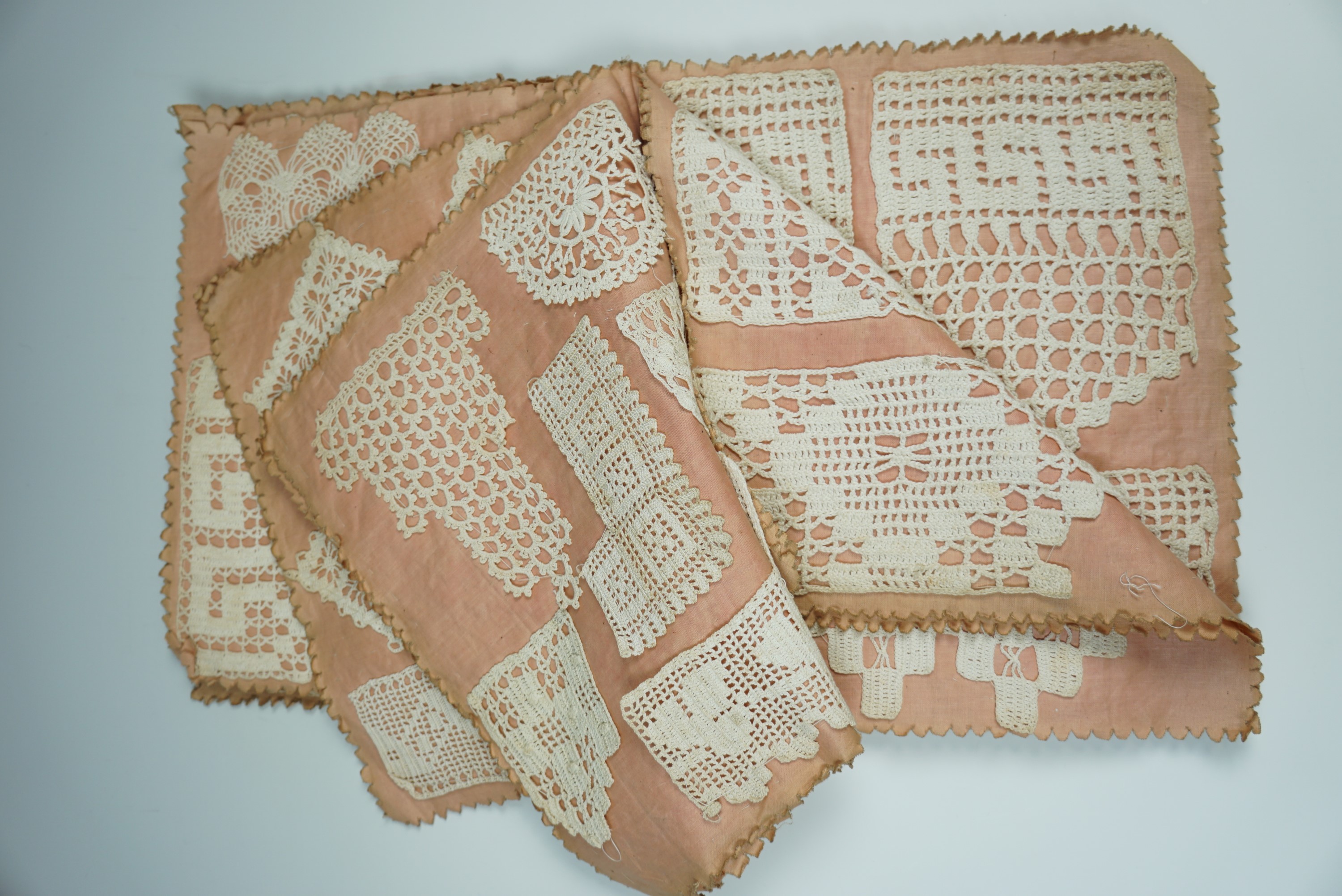 A Victorian fabric crochet work sample book