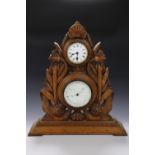 A Victorian Aesthetic movement influenced combined clock and aneroid barometer in an oak frame.