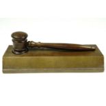 A turned wooden gavel and stand, 20 cm