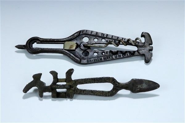 Two late 19th / early 20th Century cast steel combination corkscrews / tools together with three - Image 2 of 3